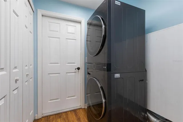 a view of a patio with table and chairs and potted plants