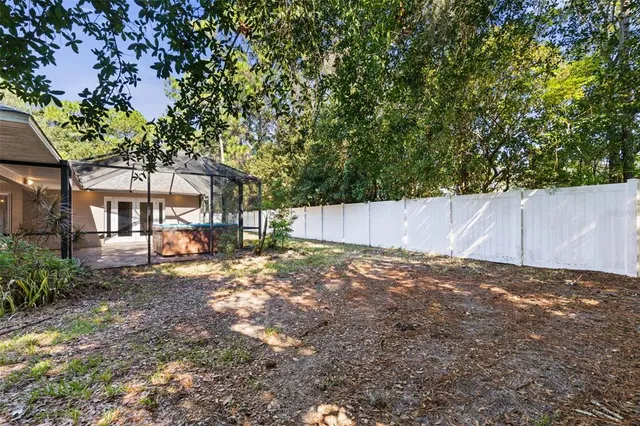 an aerial view of a house with a garden