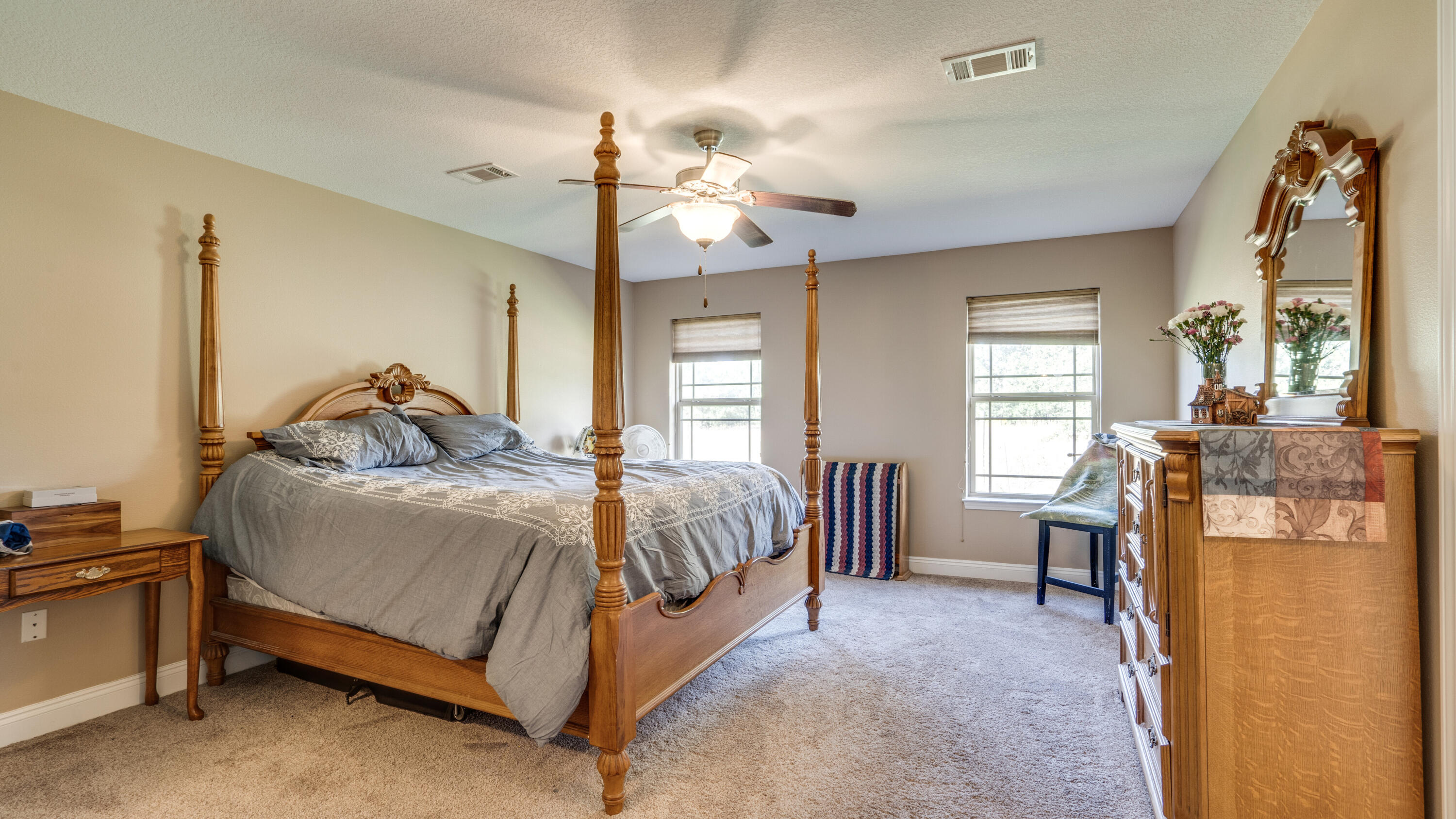 9606 South Trace Road Milton, FL 32583 - Photo 20 of 48 a bedroom with a bed and window