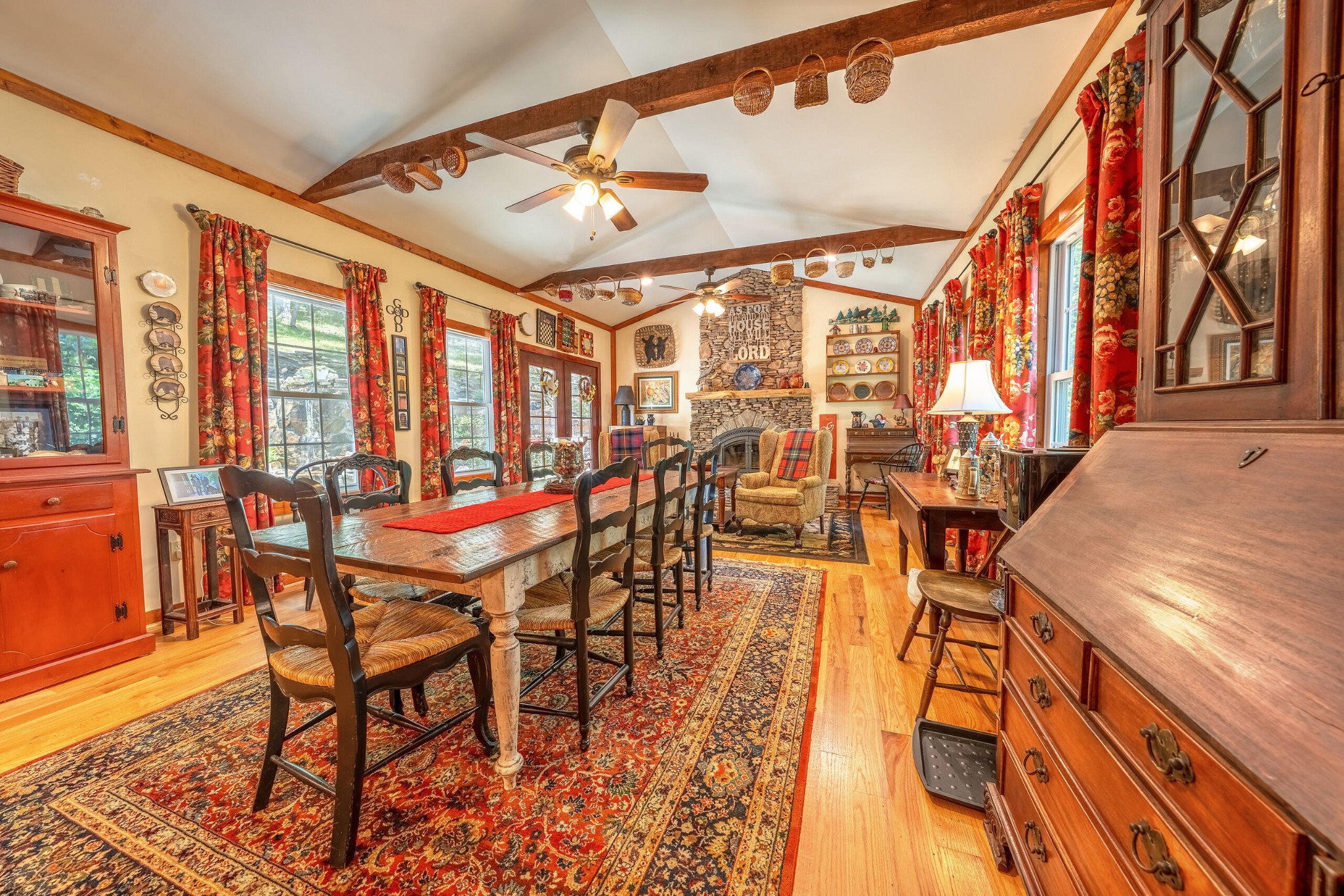 260 Deer Ridge Trail Ocoee, TN 37361 - Photo 51 of 72 a view of a dining room with furniture and wooden floor