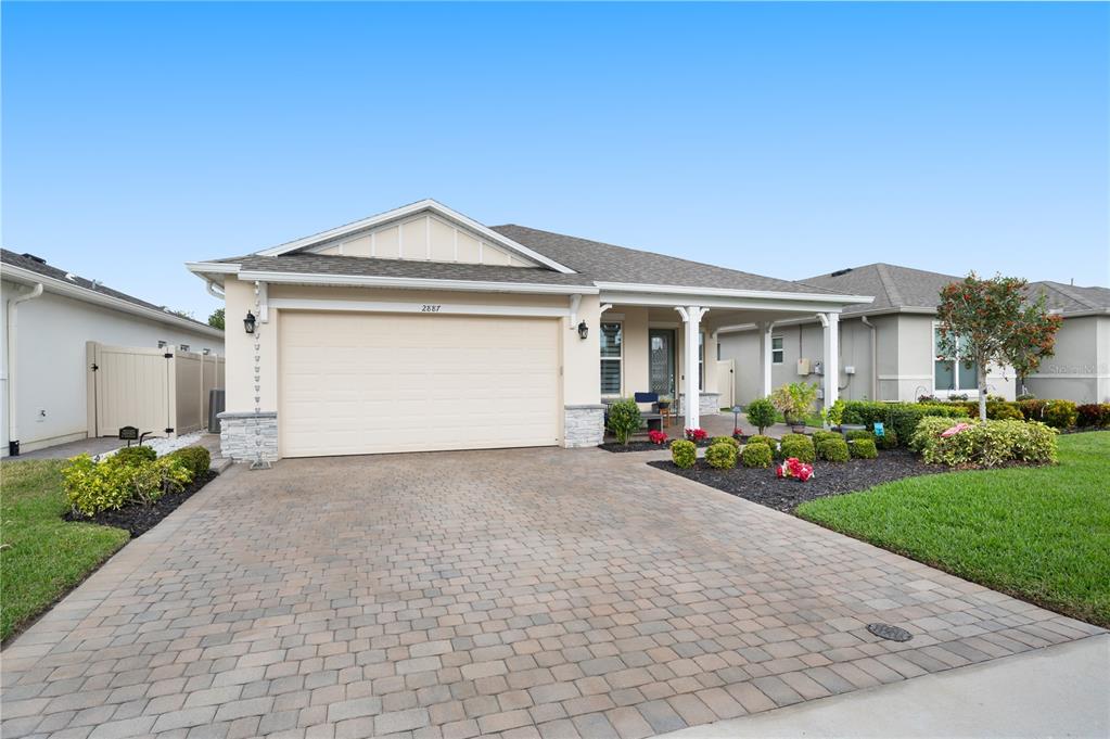2887 Parkfield Road St. Cloud, FL 34772 - Photo 3 of 51 a front view of a house with yard