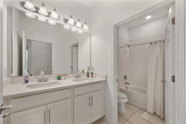 a bathroom with a shower and a bath tub