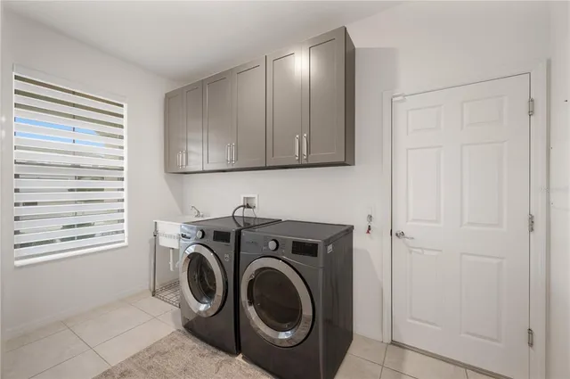 a living room with patio furniture