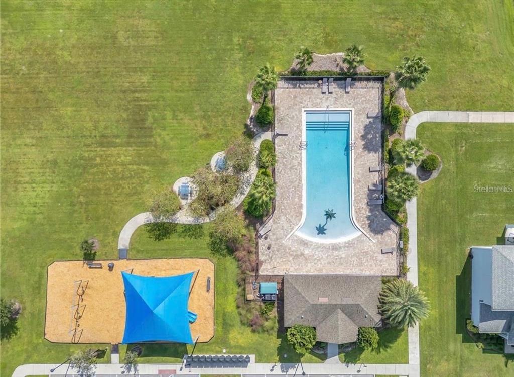 2887 Parkfield Road St. Cloud, FL 34772 - Photo 49 of 51 an aerial view of a house with a garden