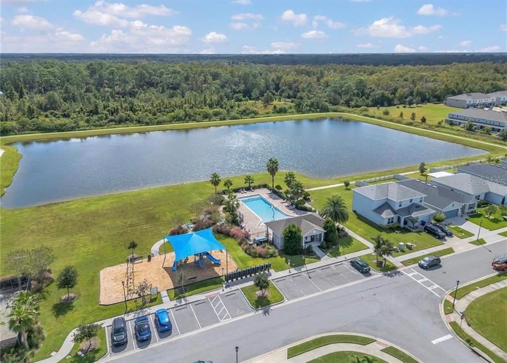 2887 Parkfield Road St. Cloud, FL 34772 - Photo 50 of 51 an aerial view of a house with a lake view
