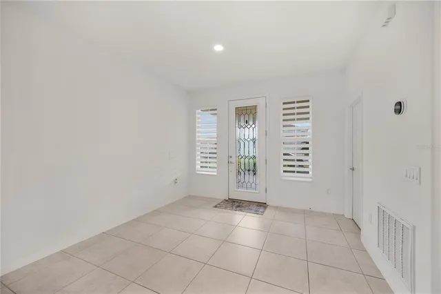 an empty room with windows