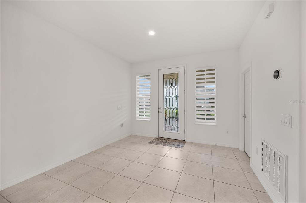 2887 Parkfield Road St. Cloud, FL 34772 - Photo 8 of 51 an empty room with windows