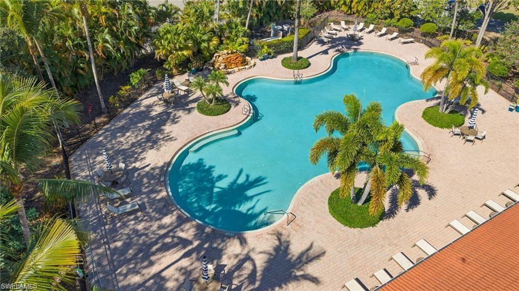 1966 Par Drive Naples, FL 34120 - Photo 25 of 32 Community pool featuring a patio