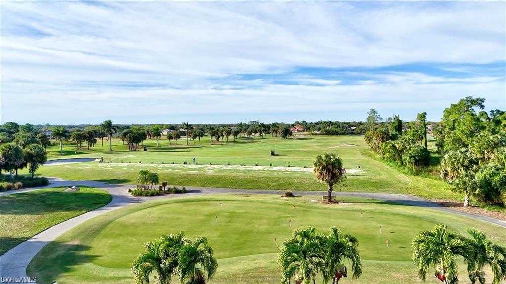 1966 Par Drive Naples, FL 34120 - Photo 30 of 32 View of home's community with view of golf course and a lawn