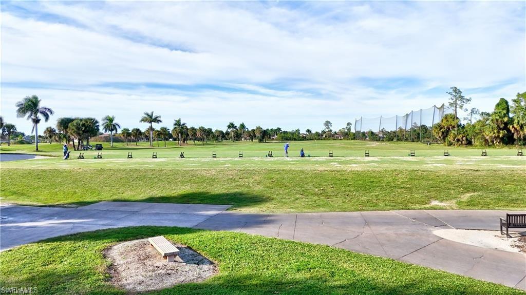 1966 Par Drive Naples, FL 34120 - Photo 31 of 32 View of home's community with a yard and golf course view