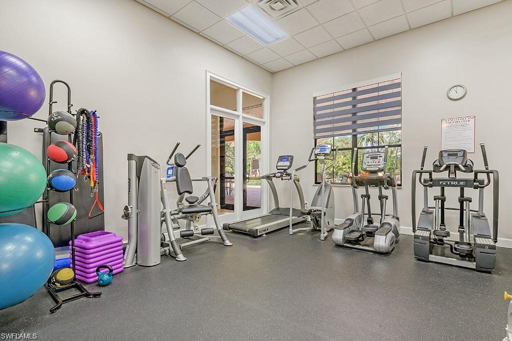 1966 Par Drive Naples, FL 34120 - Photo 32 of 32 Exercise room with a paneled ceiling and a high ceiling
