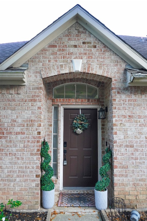 14420 Walters Road, Unit 24 Houston, TX 77014 - Photo 2 of 15 a front view of a house with plants