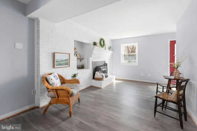 a bathroom with a toilet a sink and a mirror
