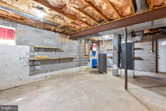 a view of a house with a wooden deck