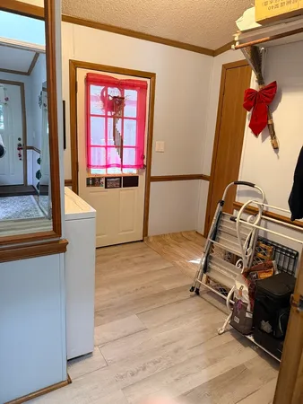 a view of a living room with a flat screen tv