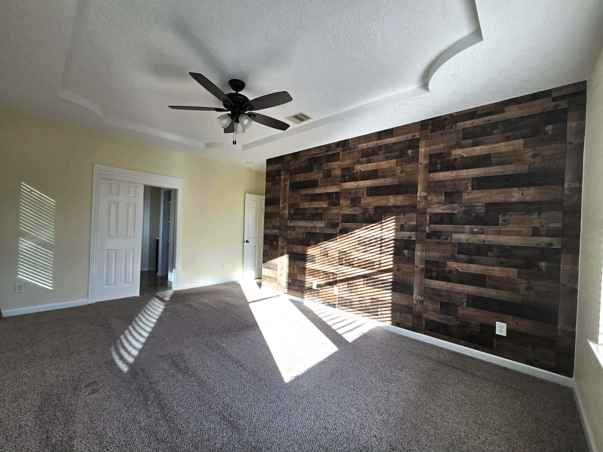 6641 Midfield Drive Houston, TX 77092 - Photo 11 of 21 a view of empty room with wooden floor and fan