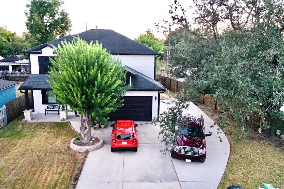 6641 Midfield Drive Houston, TX 77092 - Photo 21 of 21 a view of a backyard with chair and potted plants