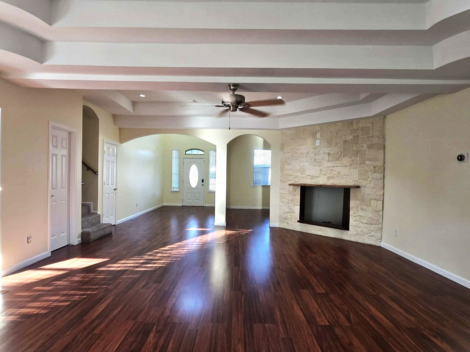 6641 Midfield Drive Houston, TX 77092 - Photo 5 of 21 a view of empty room with wooden floor and fireplace
