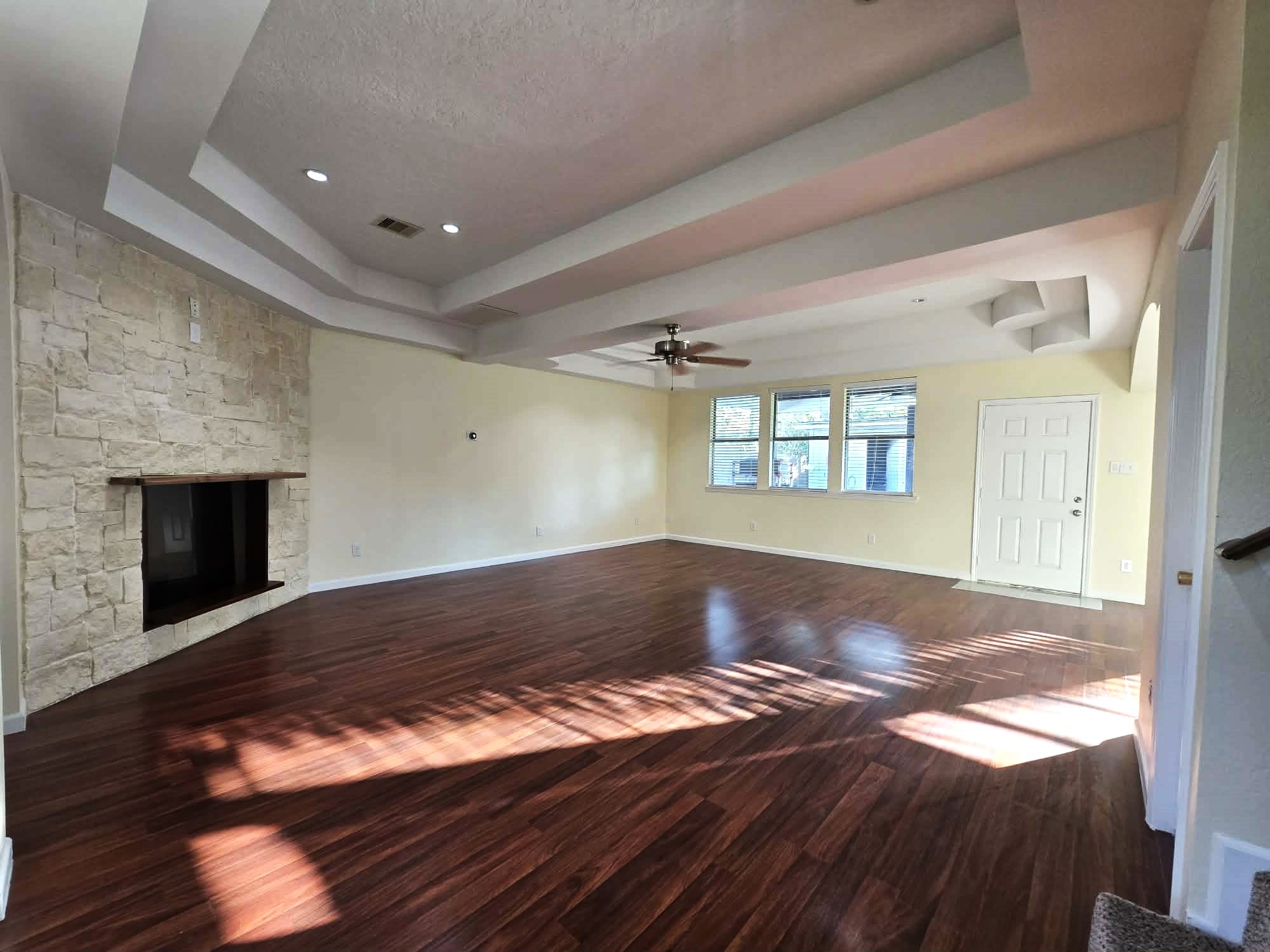 6641 Midfield Drive Houston, TX 77092 - Photo 6 of 21 a view of empty room with wooden floor and fireplace