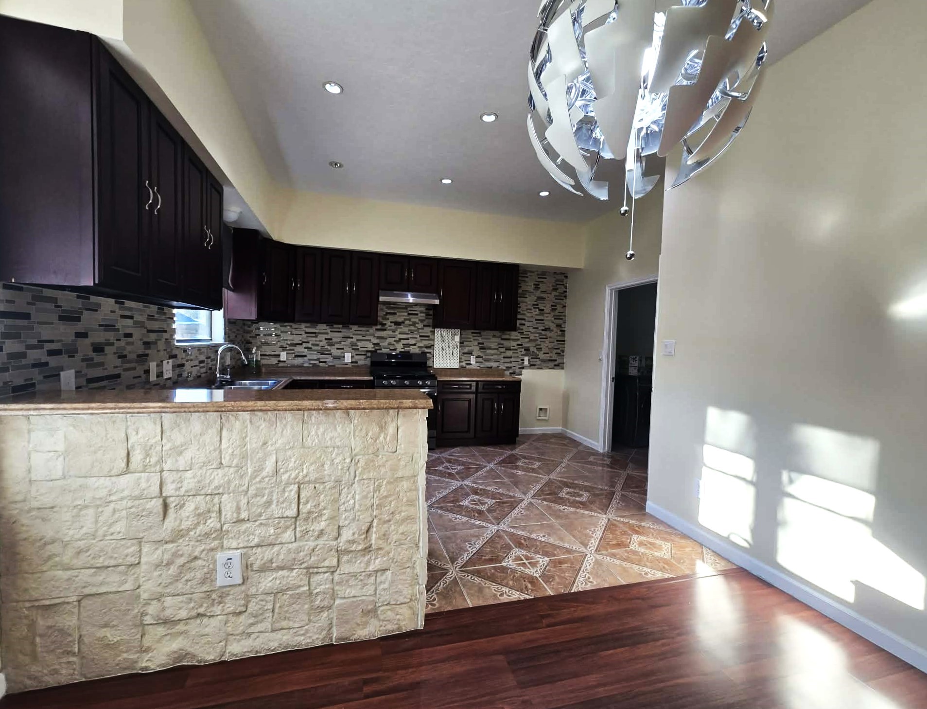 6641 Midfield Drive Houston, TX 77092 - Photo 8 of 21 a kitchen with stainless steel appliances granite countertop a sink and a stove