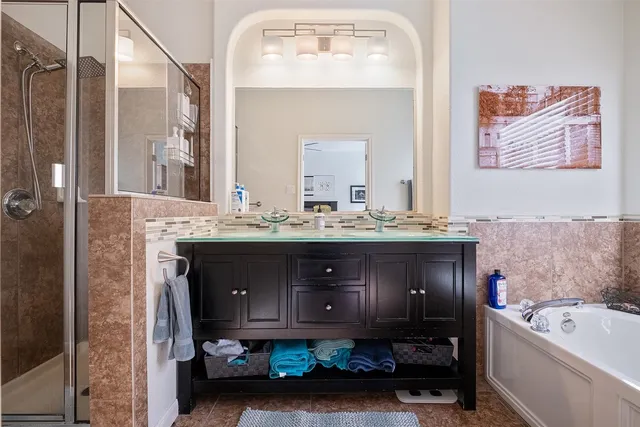 a bathroom with a sink and a bathtub