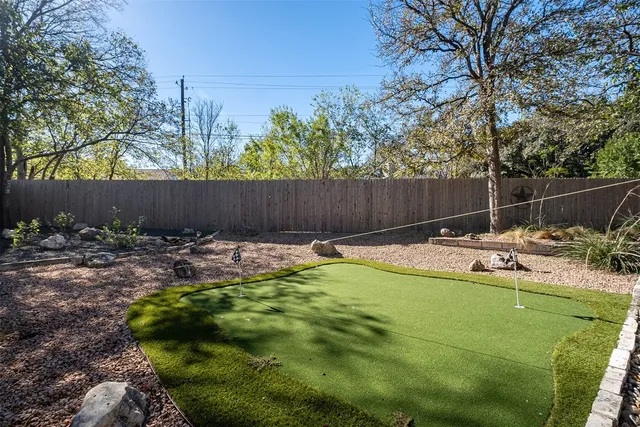 a view of swimming pool having patio