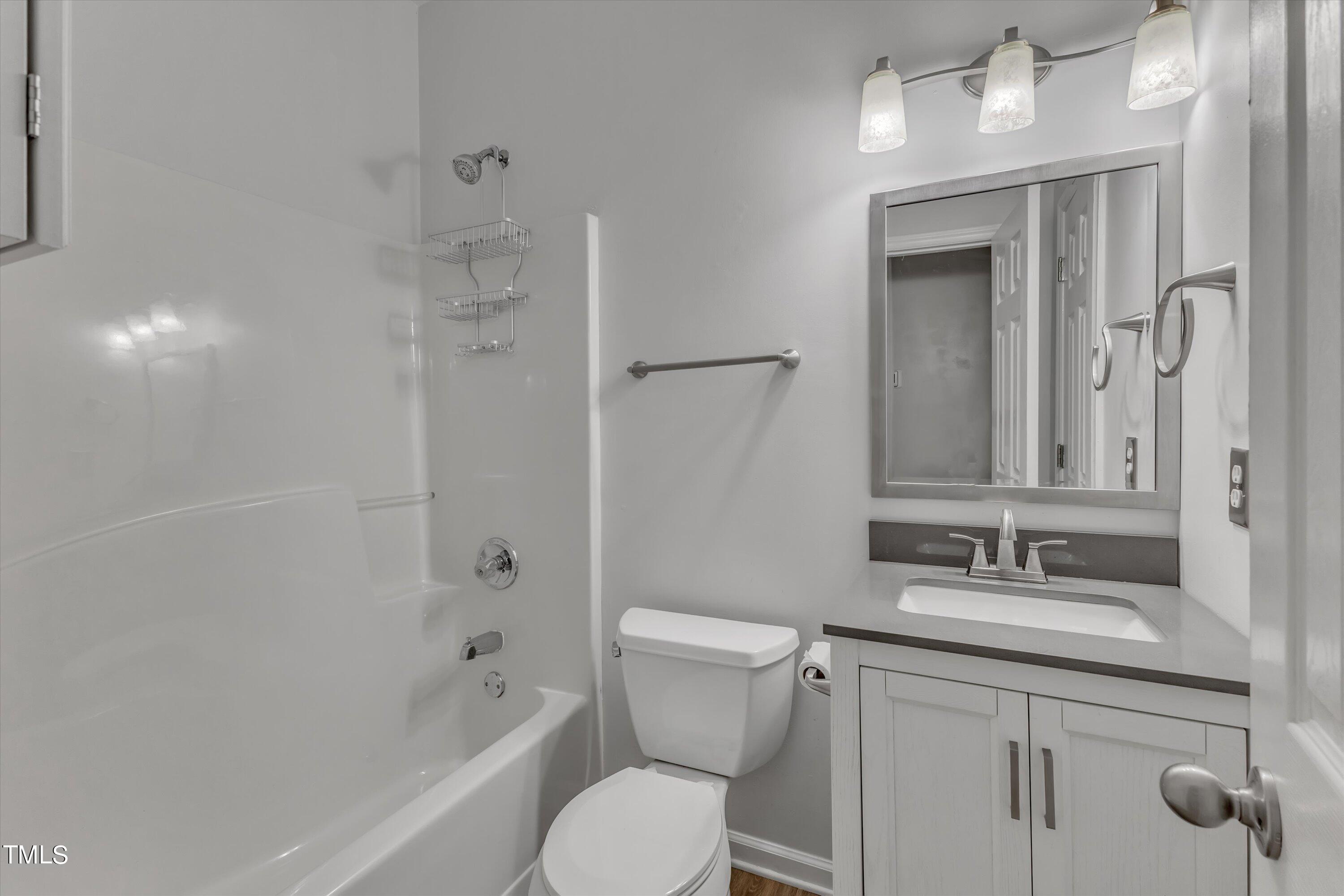 9221 Dominion Boulevard Raleigh, NC 27617 - Photo 30 of 55 Full Hall Bathroom