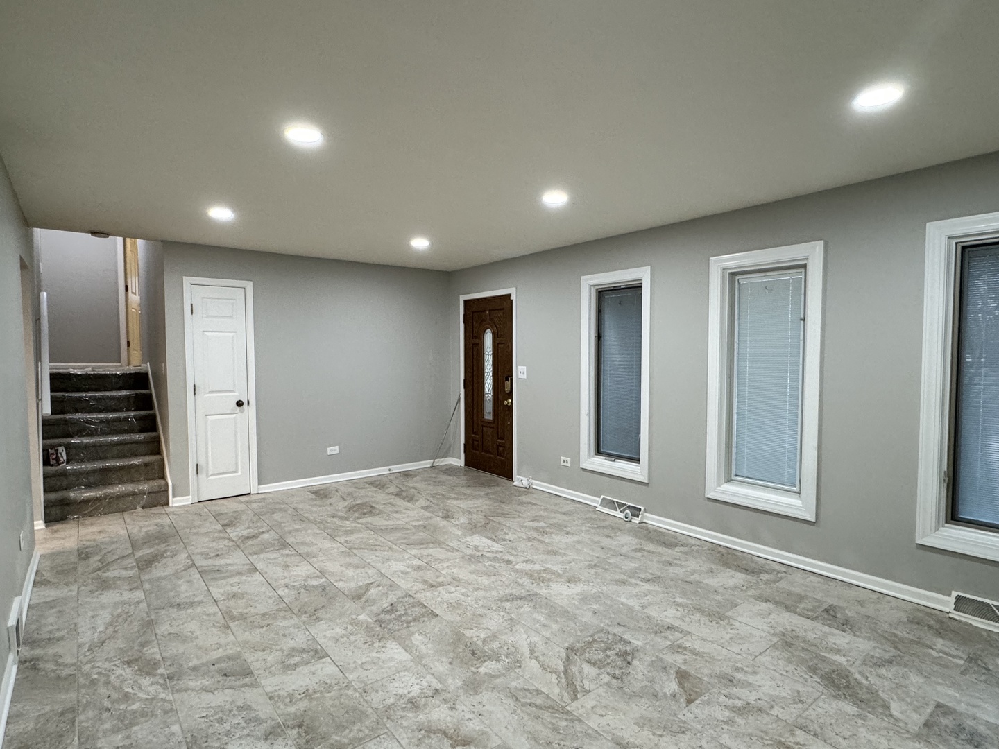810 MacGregor Road Lockport, IL 60441 - Photo 3 of 25 a view of an empty room with a fireplace