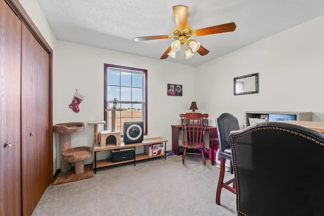 a workspace with furniture and closet