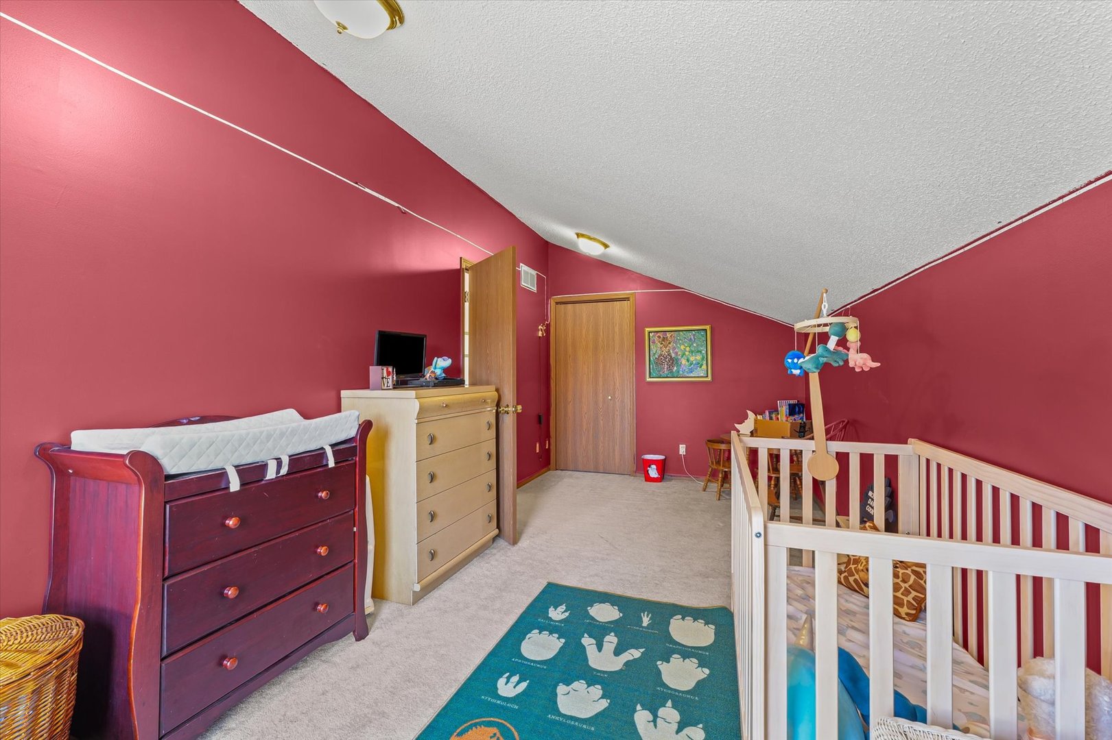 707 Country View Drive Philo, IL 61864 - Photo 25 of 28 a bedroom with furniture and a baby crib