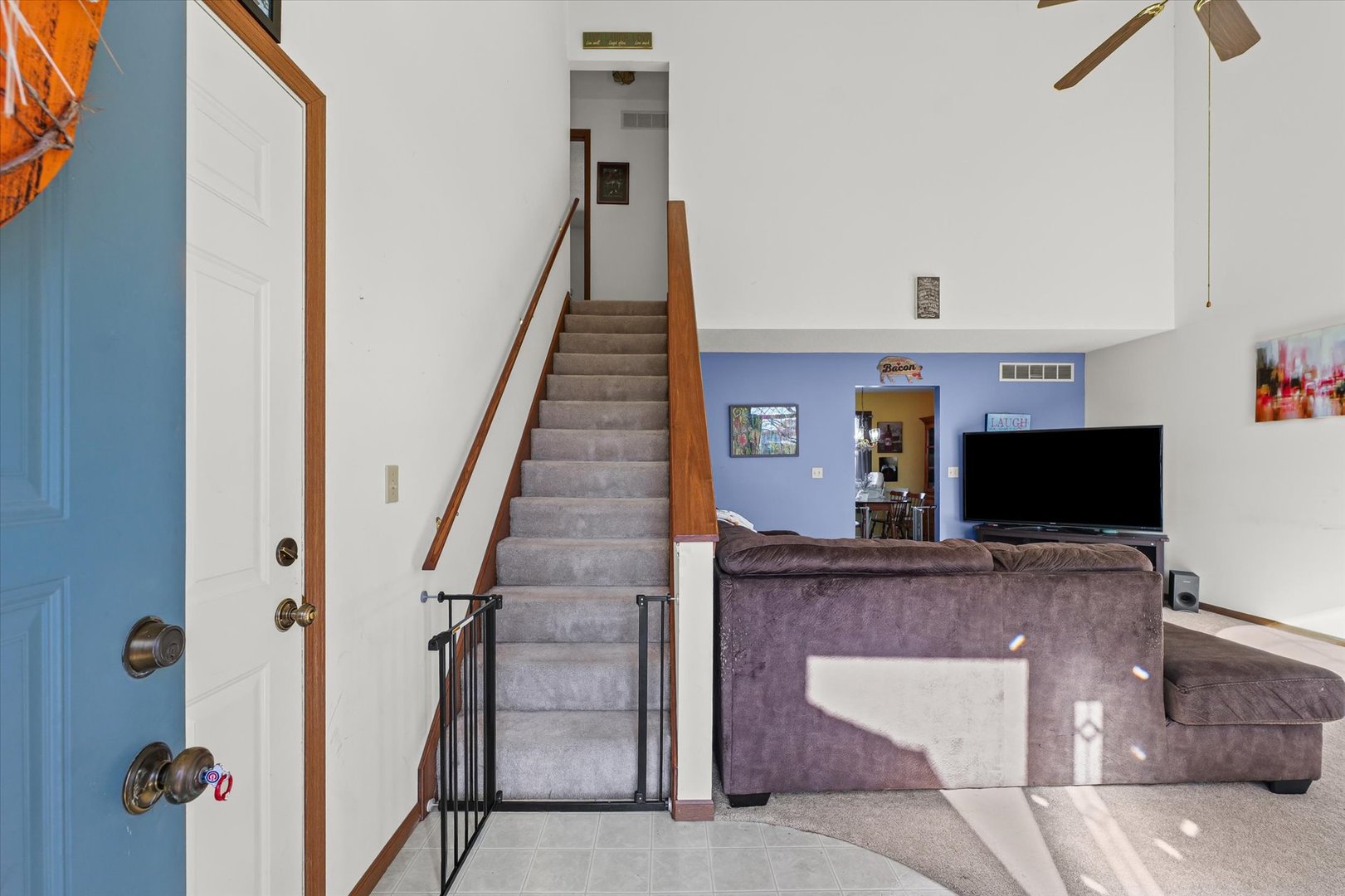 707 Country View Drive Philo, IL 61864 - Photo 3 of 28 a view of a livingroom with furniture and staircase
