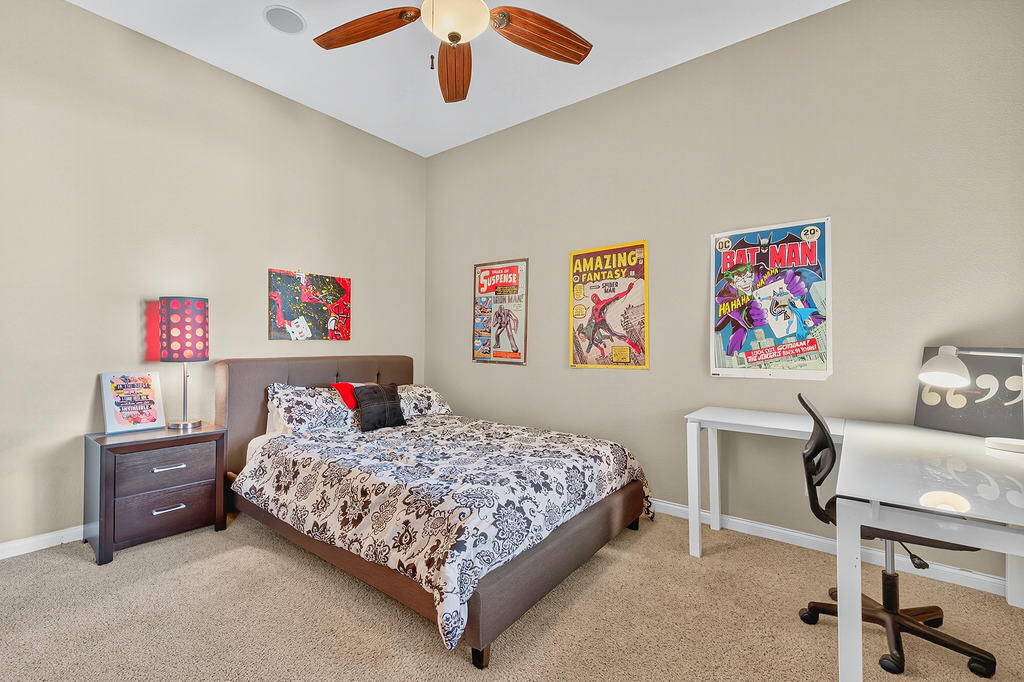 35831 Raphael Drive Palm Desert, CA 92211 - Photo 17 of 24 a bedroom with a bed and a desk