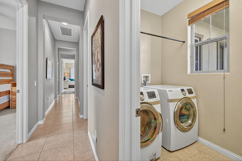 35831 Raphael Drive Palm Desert, CA 92211 - Photo 22 of 24 a utility room with dryer and washer