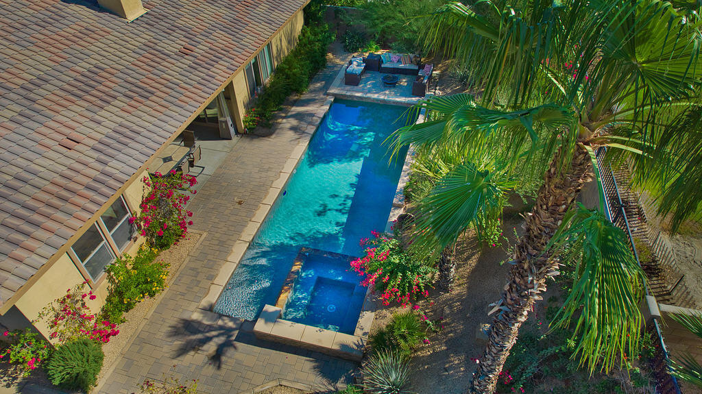 35831 Raphael Drive Palm Desert, CA 92211 - Photo 23 of 24 a backyard of a house with lots of green space