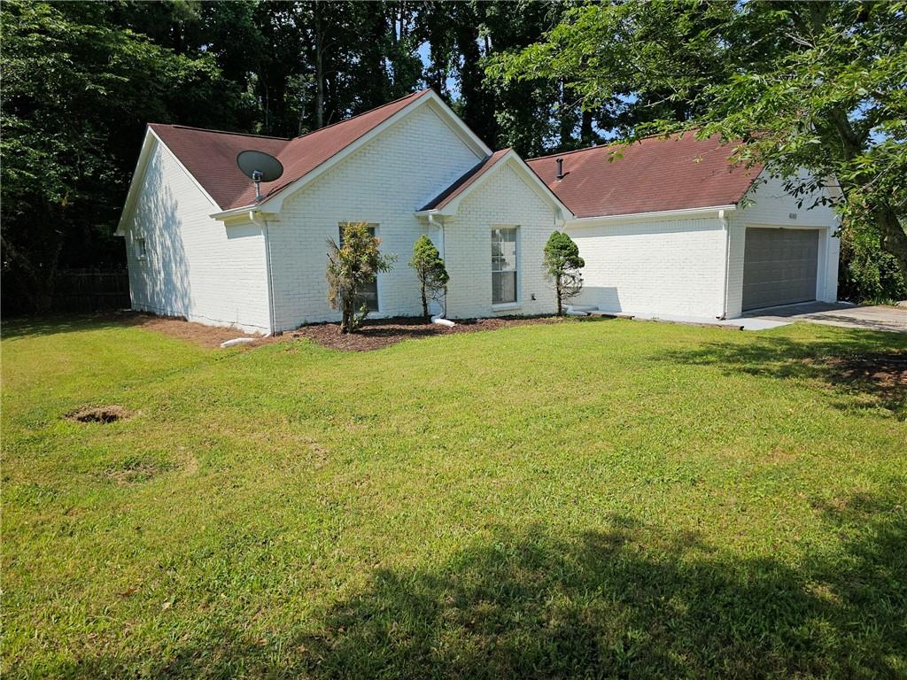 4093 Chapel Mill Bend Decatur, GA 30034 - Photo 1 of 1 a view of a house with backyard and garden
