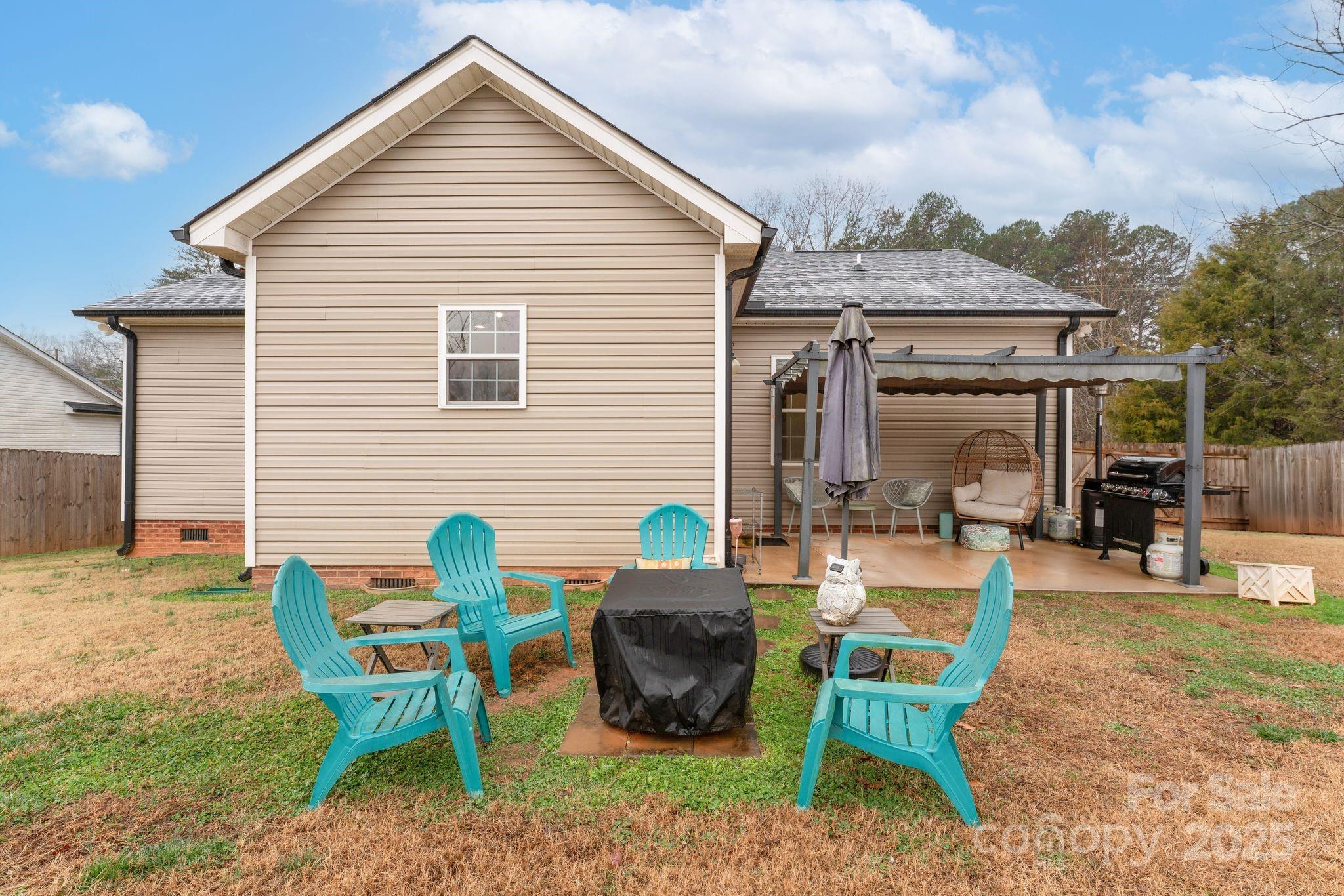 585 Stirewalt Road China Grove, NC 28023 - Photo 2 of 30 a view of a house with backyard and sitting area