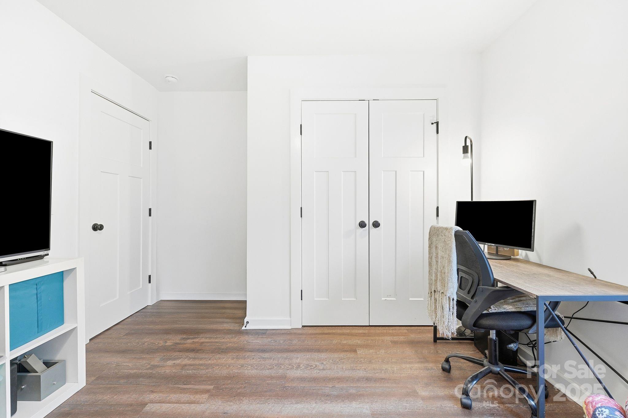 585 Stirewalt Road China Grove, NC 28023 - Photo 29 of 30 a view of a workspace with furniture and a flat screen tv