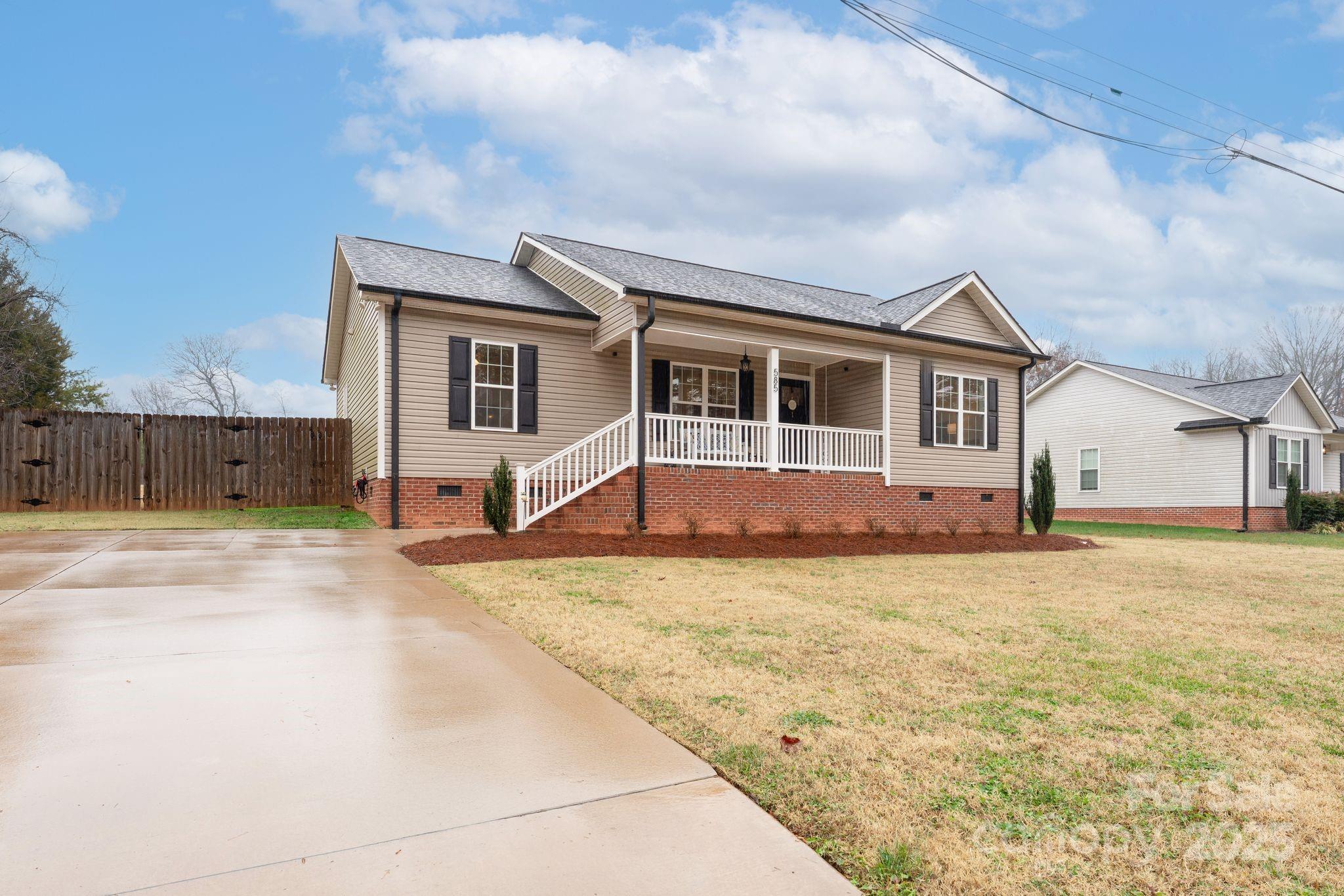 585 Stirewalt Road China Grove, NC 28023 - Photo 5 of 30 a front view of house with yard and trees in the background