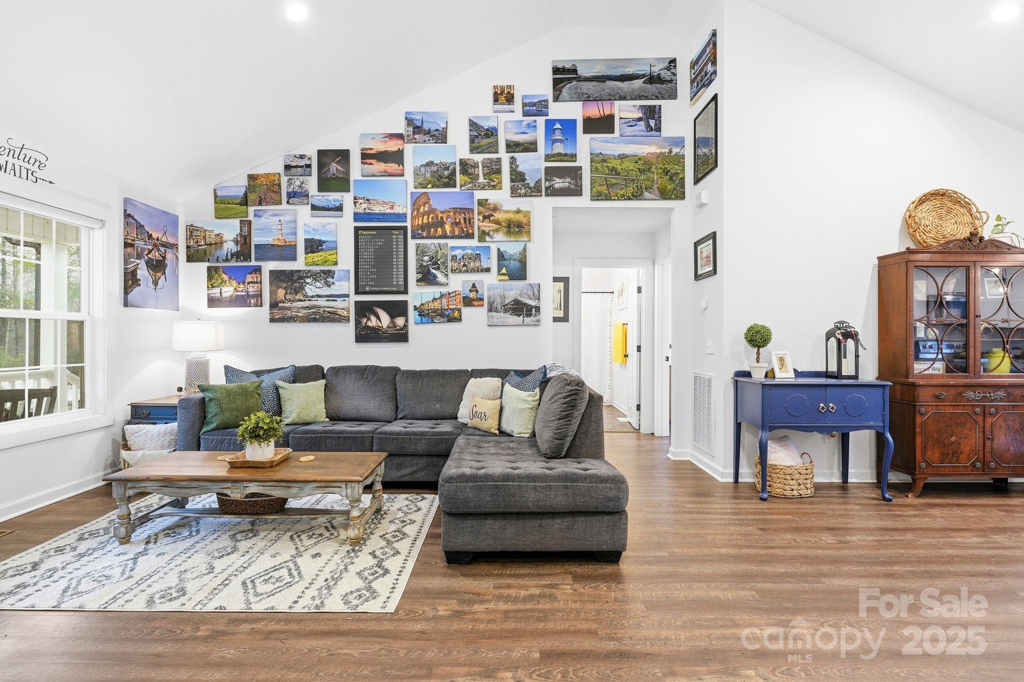 585 Stirewalt Road China Grove, NC 28023 - Photo 9 of 30 a living room with furniture and a book shelf