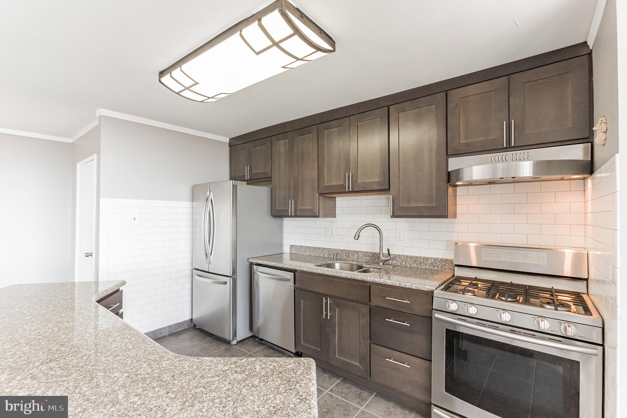 3900 West Ford Road, Unit 20M Philadelphia, PA 19131 - Photo 10 of 29 Open Kitchen