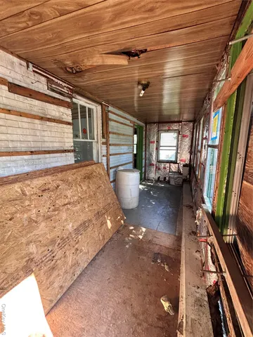 a bed room with a bed and furniture