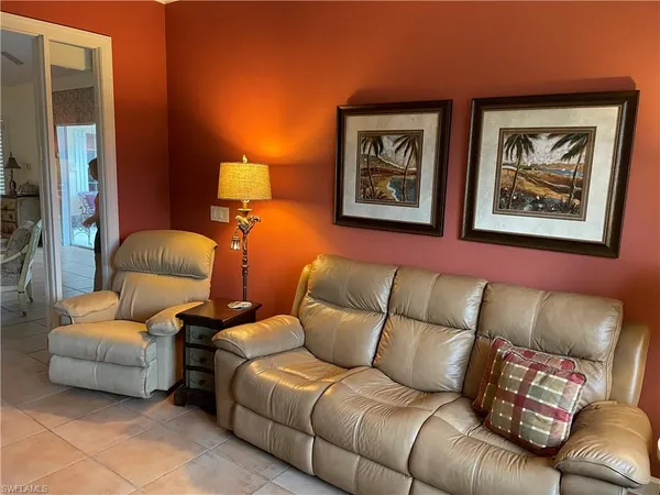 a living room with furniture and a couch