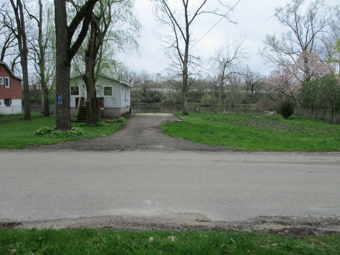 3344 East 2059th Road Ottawa, IL 61350 - Photo 17 of 17 a view of a house with a street