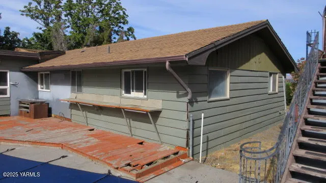 a view of a backyard of a house