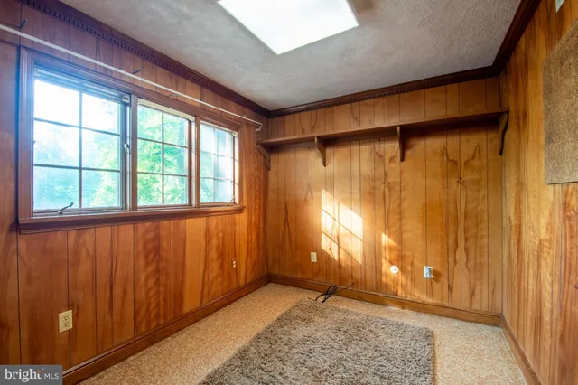 a view of a bathroom with a shower and a tub