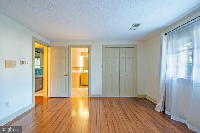 a bathroom with a shower and a shower curtain