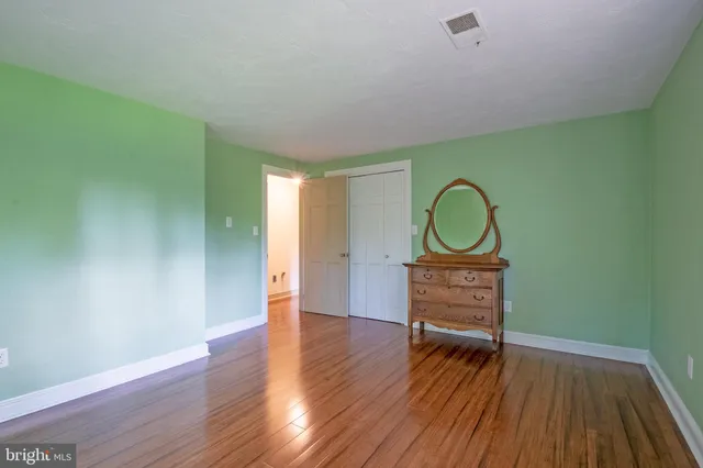 a bathroom with a tub and shower