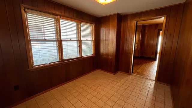 an empty room with window