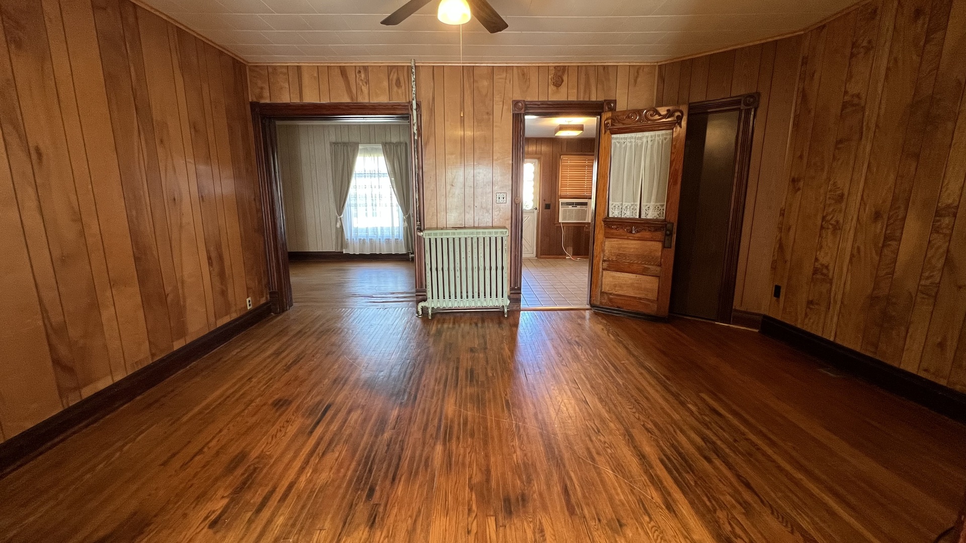 113 West Delaware Street Dwight, IL 60420 - Photo 4 of 21 a view of gallery with wooden floor