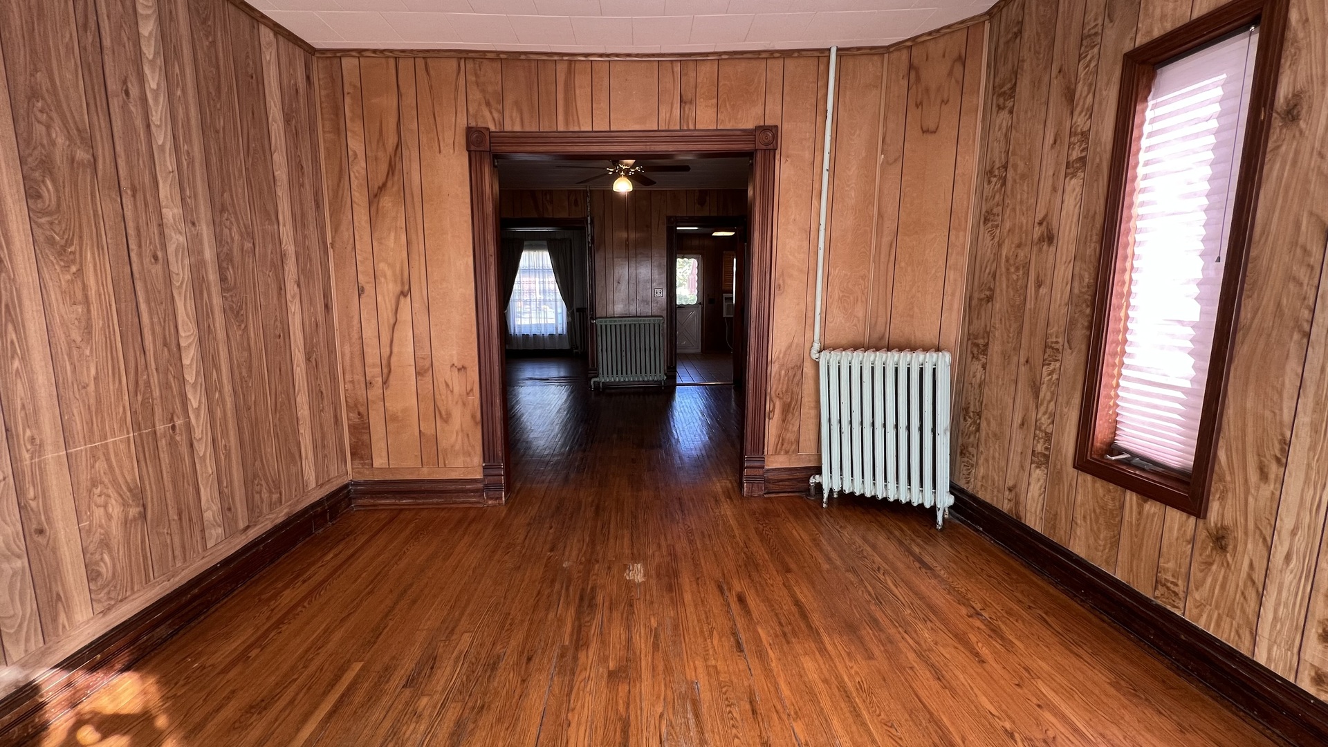 113 West Delaware Street Dwight, IL 60420 - Photo 6 of 21 a view of a room with wooden floor and stairs